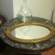 miroir ovale moulure sculptée dorée