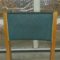chaise dite Julienne en bois clair et skaï vert,années 1950